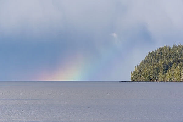 US, AK, Ketchikan, Rainbow glow on horizon Tongass Narrows Inside Passage near Settlers