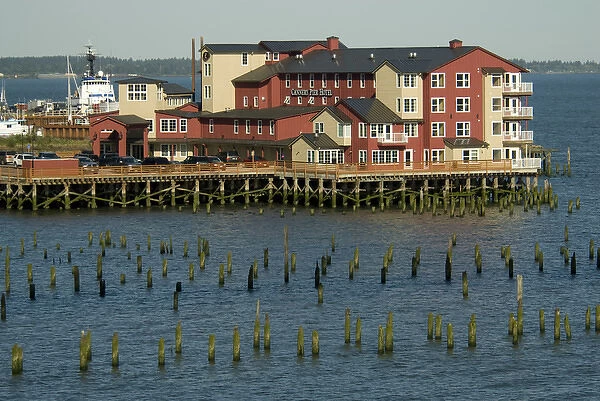 US: Oregon, Columbia River Basin, Astoria, Cannery Pier Hotel and old cannery pilings