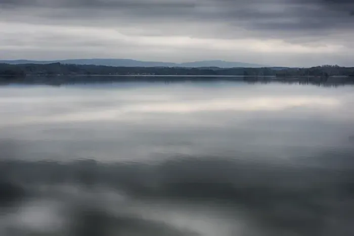 Framed Print : US, TN, Watts Bar Lake. Glass calm reflects cloud patterns