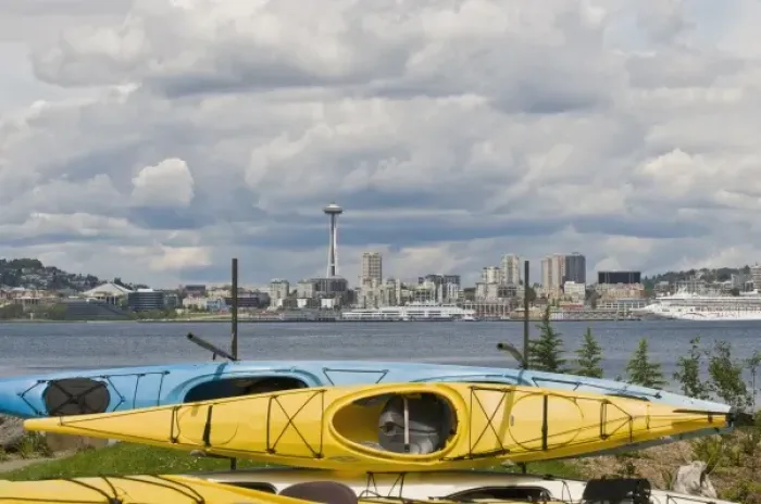Framed Print : US, WA, Seattle. Kayaks on racks in West Seattle frame the downtown Seattle skyline Framed Print : US, WA, Seattle. Kayaks on racks in West Seattle frame the downtown Seattle skyline