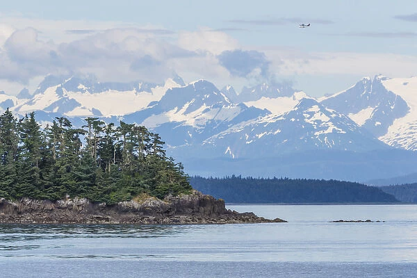 USA, Alaska. Air taxi flies over mountain landscape