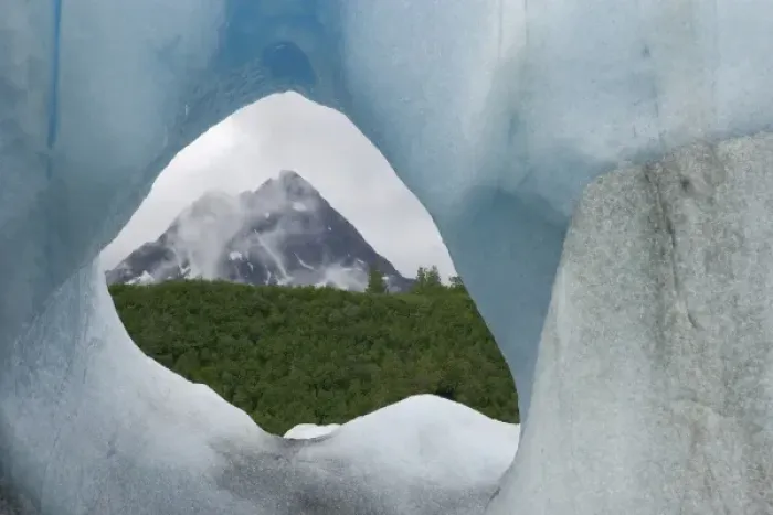 Framed Print : USA, Alaska, Alsek Lake. Mountain framed by iceberg Framed Print : USA, Alaska, Alsek Lake. Mountain framed by iceberg