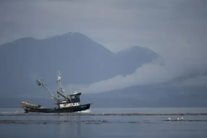 Framed Print : USA, Alaska, Angoon, FV Lady Jane, a salmon fishing boat, motors past fog-shrouded