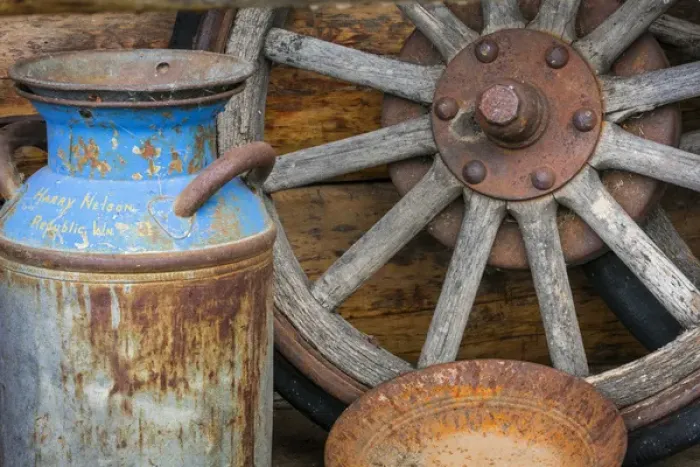 Framed Print : USA, Alaska. Antique milk can, wagon wheel and gold pan Framed Print : USA, Alaska. Antique milk can, wagon wheel and gold pan