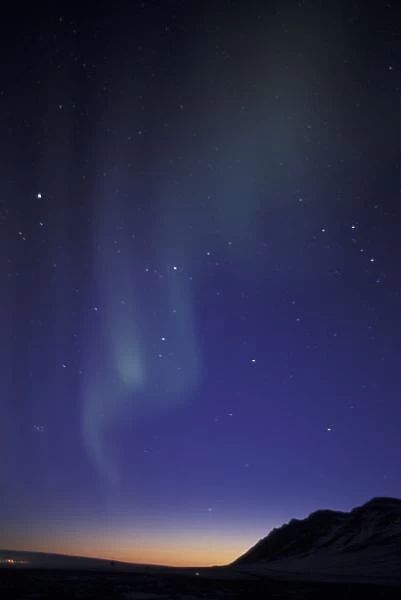 USA, Alaska, Brooks Range. Northern lights (aurora borealis); curtain of green light