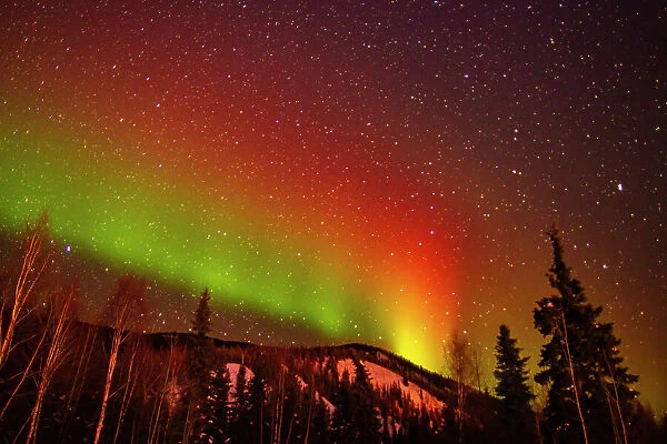 USA, Alaska, Chena Hot Springs Resort. Aurora borealis and mountain
