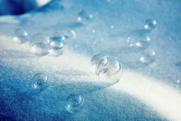 USA, Alaska, Chena Hot Springs Resort. Close-up of bubbles on snow