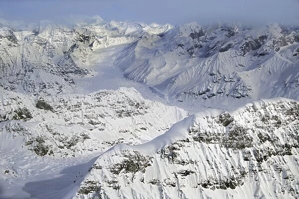 USA, Alaska, Denali National Park, Alaska Range. Heavy spring snowstorm covers mountains