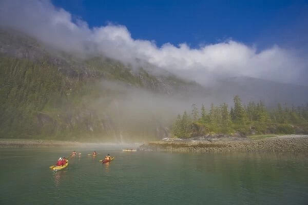 USA, Alaska, Endicott Arm, Fords Terror. Sea kayakers in fog at entrance to Fords Terror