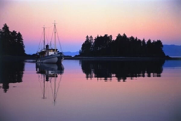USA, Alaska, , Frederick Sound, Brother Islands. Ship anchored at Brother Islands at sunset
