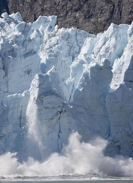 USA, Alaska, Glacier Bay National Park, Icebergs calve with explosive splash
