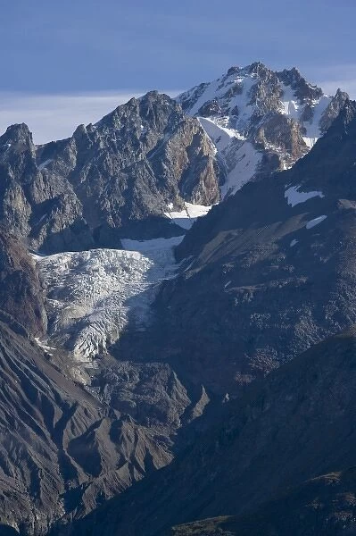 USA, Alaska, Glacier Bay National Park, Receding alpine glacier in mountain peaks above Tarr Inlet
