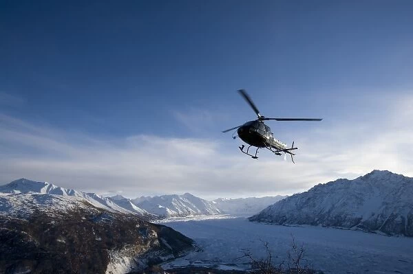USA, Alaska, Helicopter flying above Matanuska Glacier and Chugach Range mountain