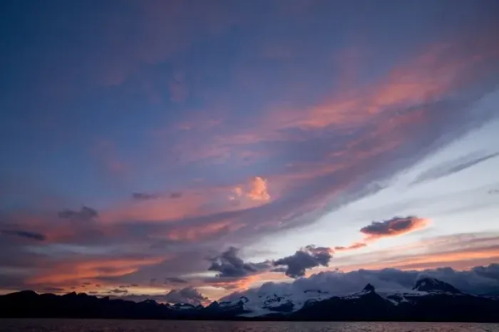Framed Print : USA, Alaska, Katmai National Park, Midnight sun lights clouds above mountains along