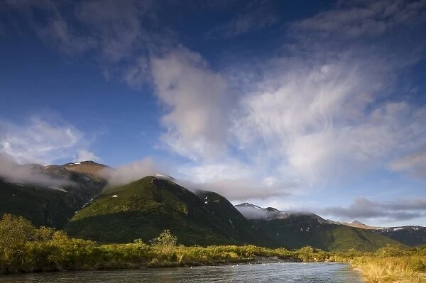 USA, Alaska, Katmai National Park, Kinak Bay, Setting sun lights mountain peaks