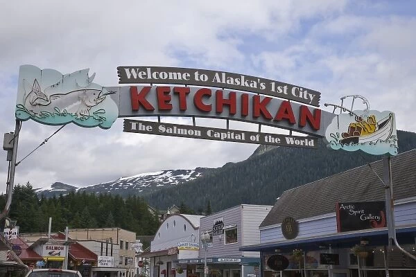 USA, Alaska, Ketchikan. Welcome sign spans street lined with businesses