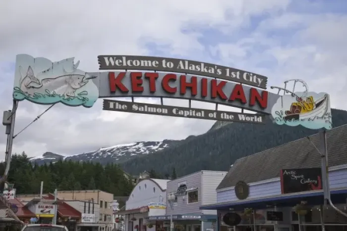 Framed Print : USA, Alaska, Ketchikan. Welcome sign spans street lined with businesses Framed Print : USA, Alaska, Ketchikan. Welcome sign spans street lined with businesses