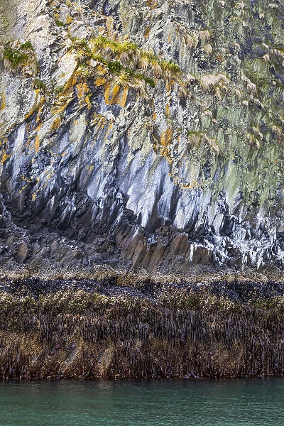 USA, Alaska, Sitka. Rocky cliffs of St. Lazaria Island. Credit as