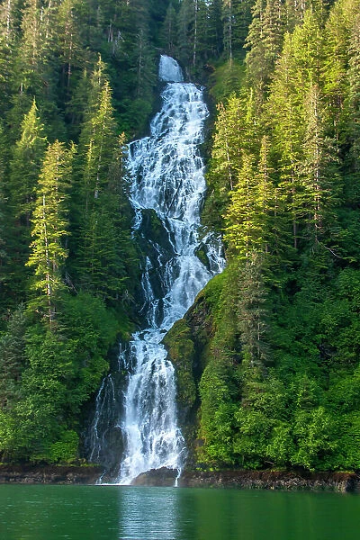 USA, Alaska, Tongass National Forest. Waterfall into Red Bluff Bay