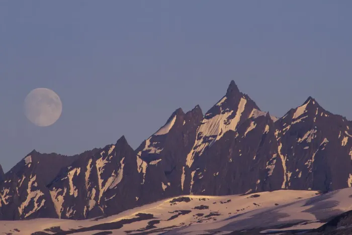 Framed Print : USA, Alaska, Valdez Moon rises above rugged Chugach Range mountains near Valdez