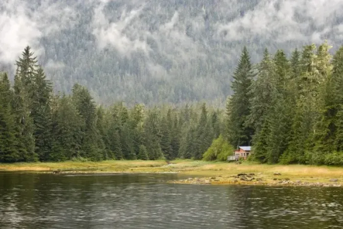 Framed Print : USA, Alaska, Wrangel. Isolated cabin at edge of forest and lake Framed Print : USA, Alaska, Wrangel. Isolated cabin at edge of forest and lake