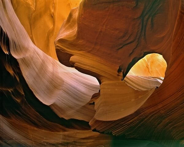 USA, Arizona, Antelope Canyon. Indirect light enhances the sculpted sides of Antelope Canyon