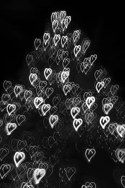 USA, Arizona, Buckeye. Black and white abstract motion of Christmas tree at night