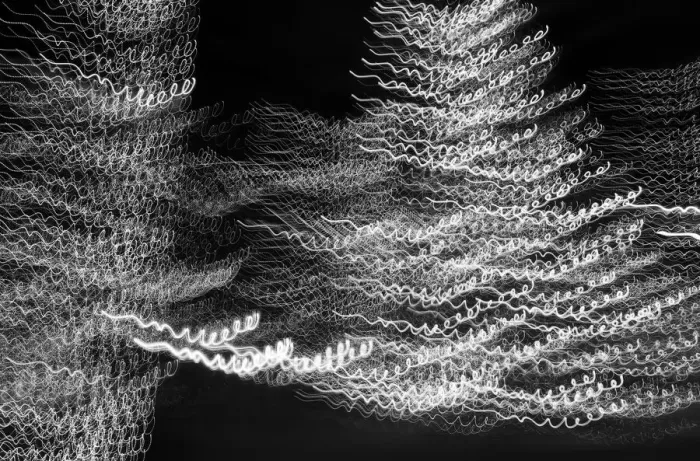 Framed Print : USA, Arizona, Buckeye. Black and white abstract motion of Christmas tree at night