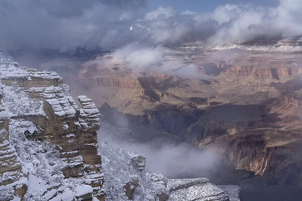 USA, Arizona, Grand Canyon National Park. Clearing snowstorm over canyon
