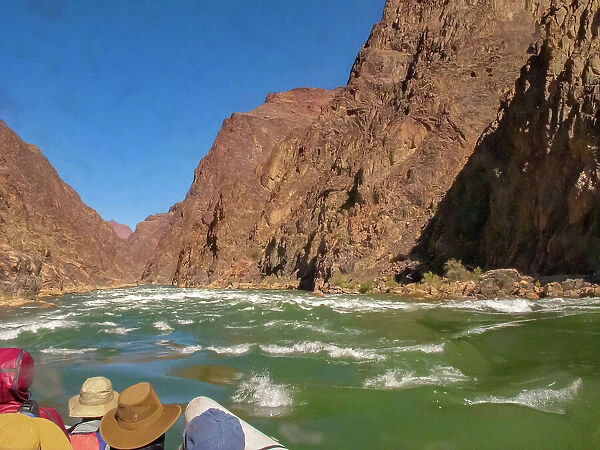 USA, Arizona, Grand Canyon National Park. Approaching rapids in raft on Colorado River