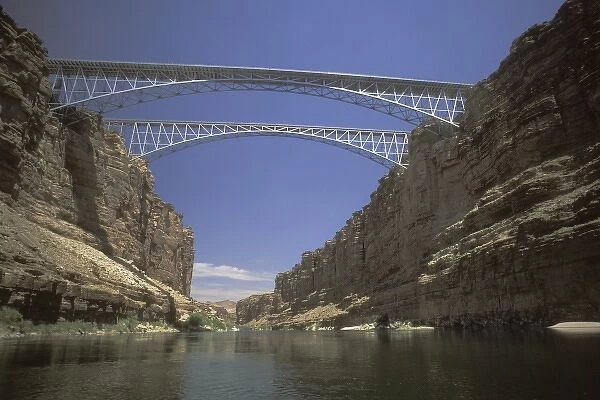 USA, Arizona. Navajo Bridge, alongside its decommissioned predecessor, spans the