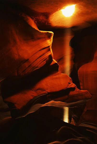 USA, Arizona, Page, Shaft of sunlight penetrating through antelope canyon
