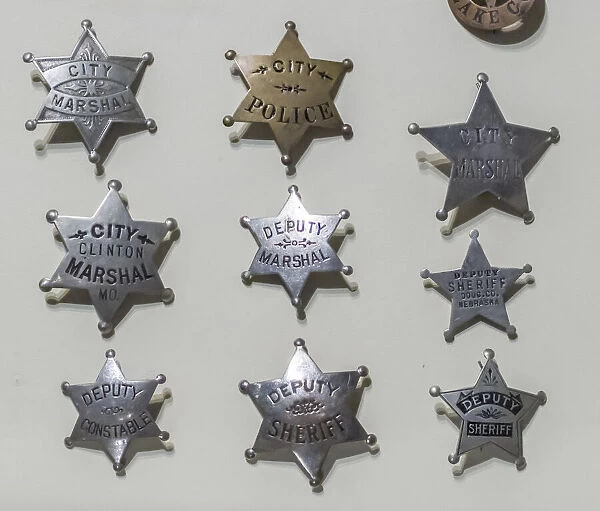 USA, Arizona, Scottsdale. Close-up of law enforcement badges from wild west