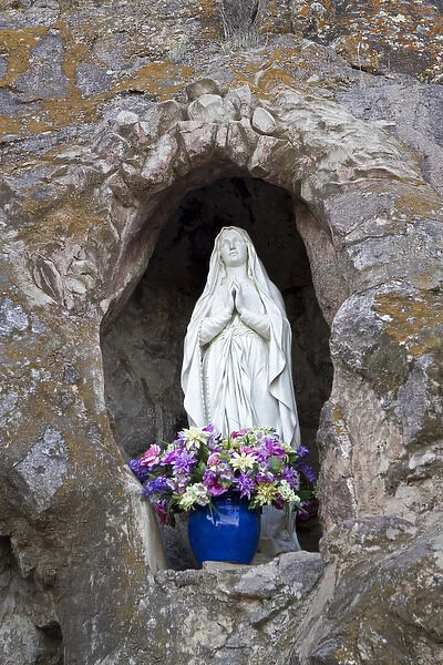 USA, Arizona. Statue of the Virgin Mary at Mission San Xavier del Bac, a historic