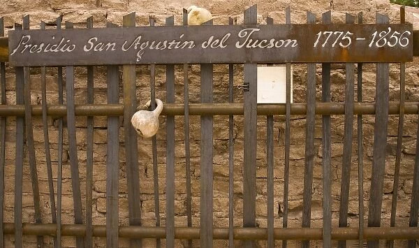 USA, Arizona, Tucson. Fence with gourd at El Presidio San Agustin del Tucson military post