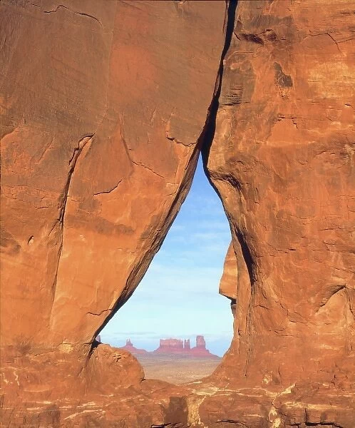 USA, Arizona. View of formations through famous Teardrop Window through rock face