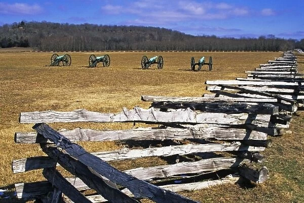 USA, Arkansas. Split-rail fence and Civil War cannons at Pea Ridge National Military Park