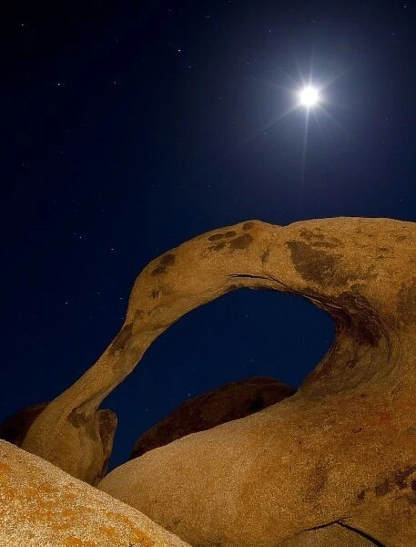 USA, California, Alabama Hills. Moonrise behind Mobius Arch near Lone Pine