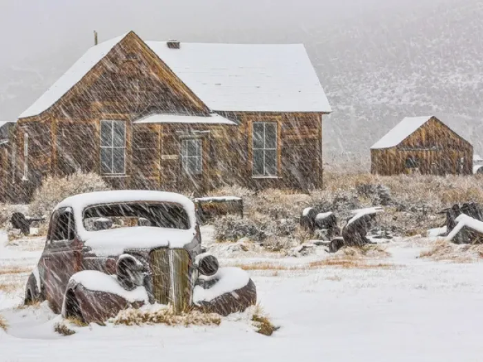 Framed Print : USA, California, Bodie. Abandoned car and buildings in snowfall