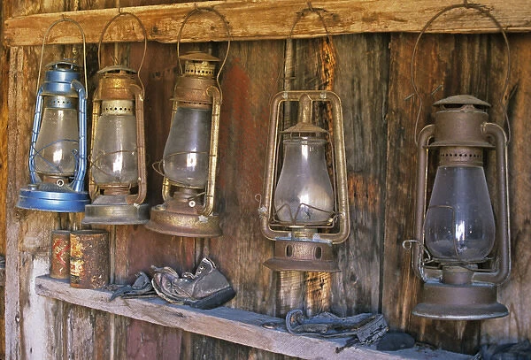 USA, California, Bodie State Historic Park. Lanterns for sale hang inside Boone s