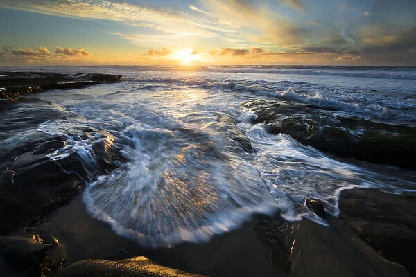 USA, California, La Jolla. Shore waves at sunset