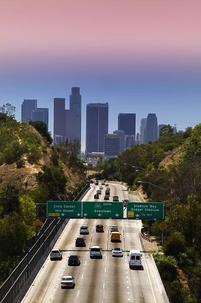 USA, California, Los Angeles. View of freeway and downtown skyscrapers