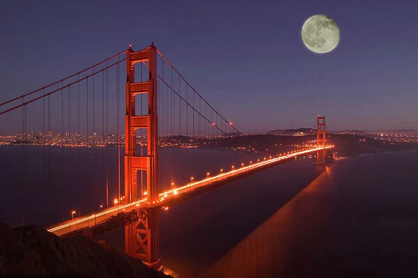 USA, California, Marin. Moonrise above the Golden Gate Bridge and San Francisco