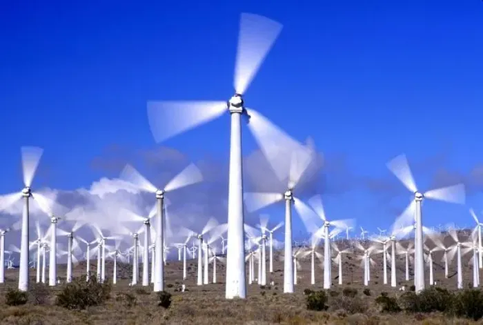 Framed Print : USA, California, Mojave. View of a wind turbine farm in action