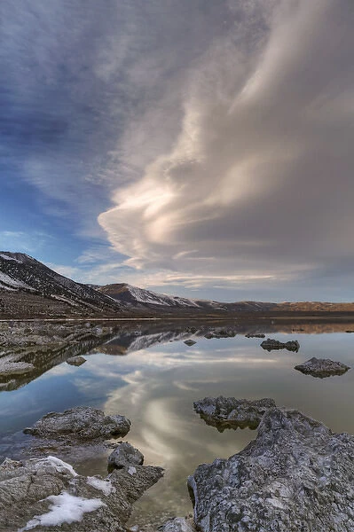 USA, California, Mono Lake. Lenticular cloud reflects in lake