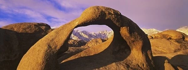 USA, California. A natural arch in the Alabama Hills frames Mt. Whitney in the Sierra Nevada Range