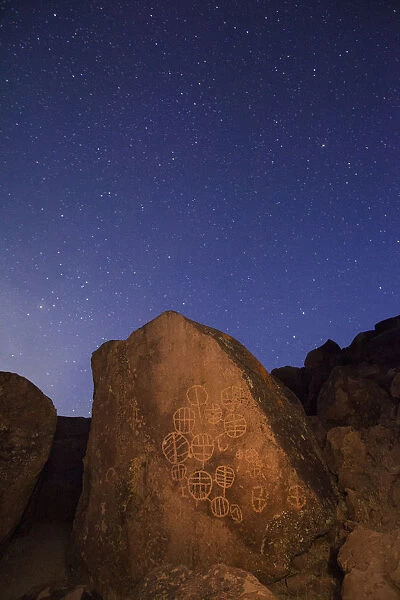 USA, California, Owens Valley. Native American petroglyphs at night