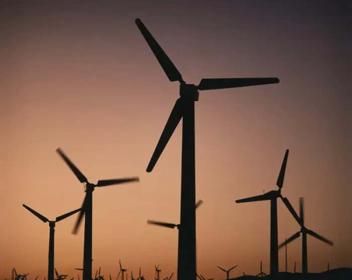 Framed Print : USA, California, Palm Springs, View of silhouetted wind turbines at sunset