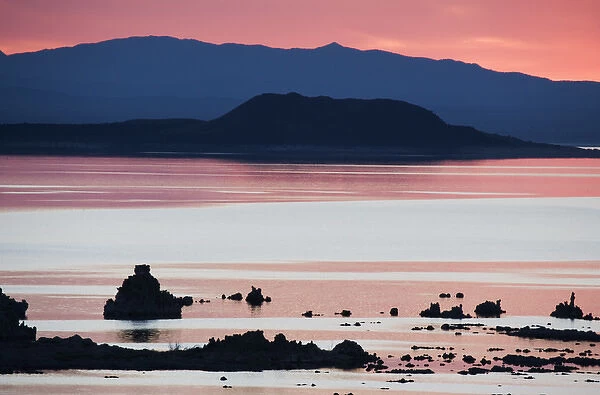 USA, California. Predawn light at Mono Lake silhouettes tufas