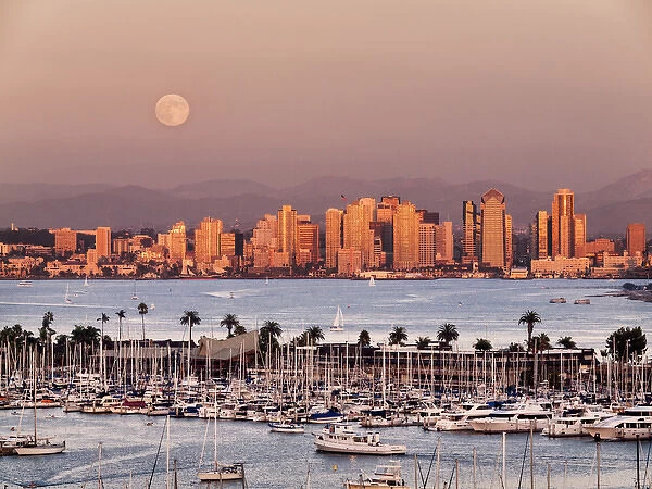 USA, California, San Diego, Full moon rises over boats and city on San Diego Harbor